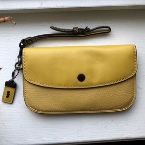 Authentic mustard yellow Coach wristlet